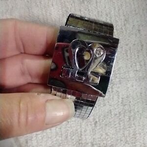 Silvertone black faux leather mirror heart crystal bracelet